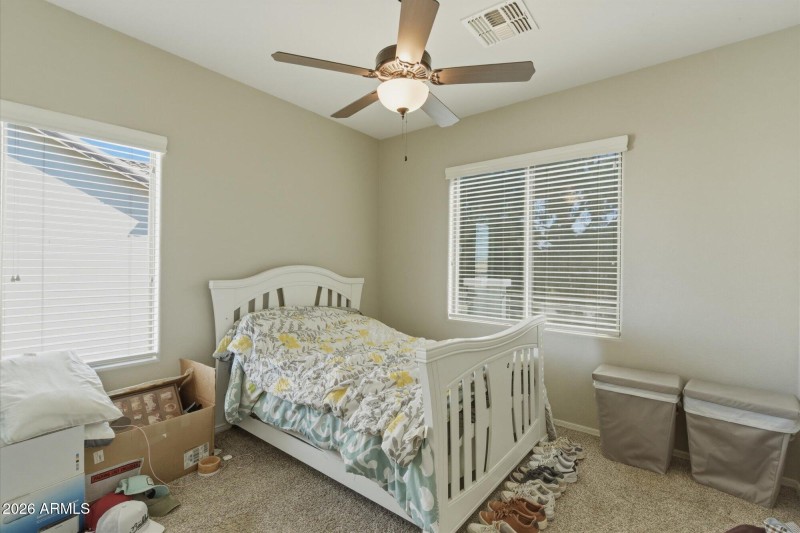 Cozy Bedroom with Dual Windows