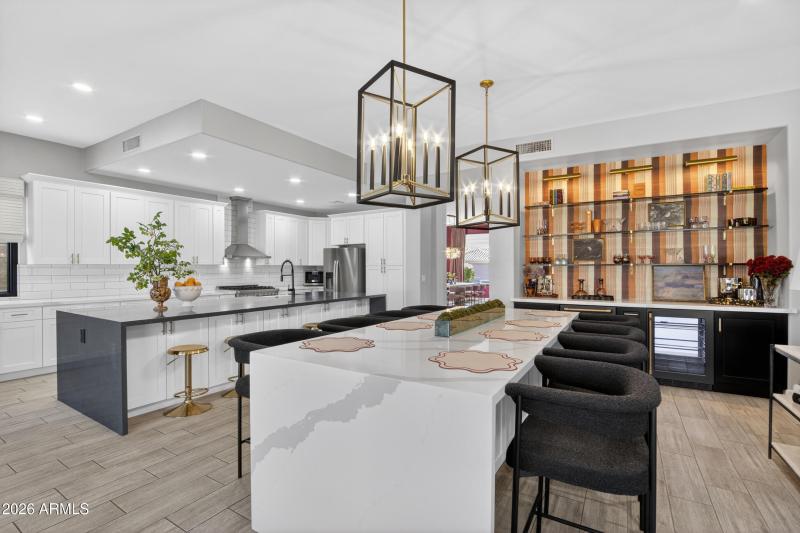 Kitchen waterfall island dry bar