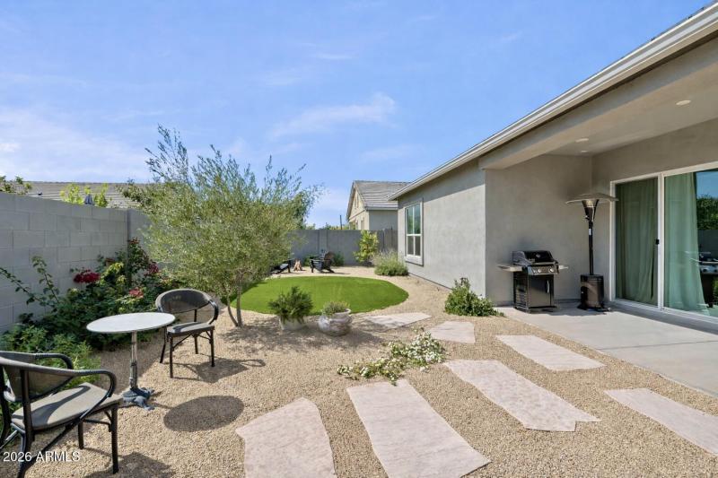 Low maintence backyard, turf and gravel