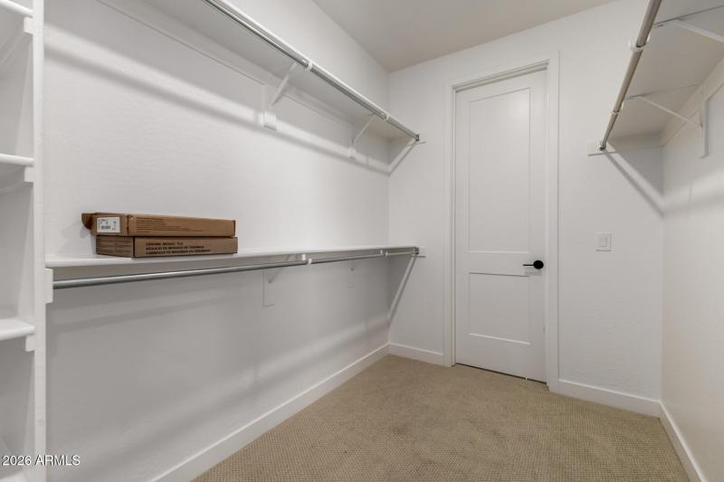 Master closet w/door to laundry room