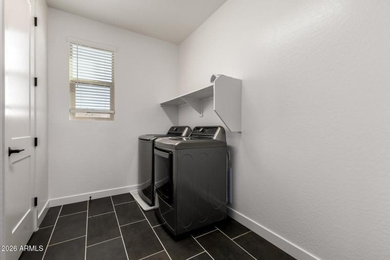 Upstairs Laundry w/door to master closet