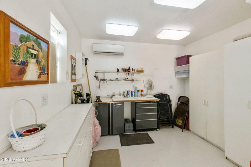 Golf cart garage AC'd workshop