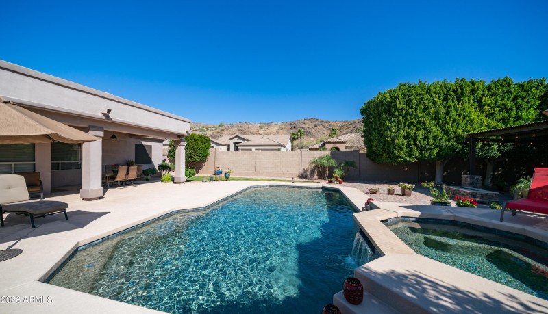Pool, spa and mountian views