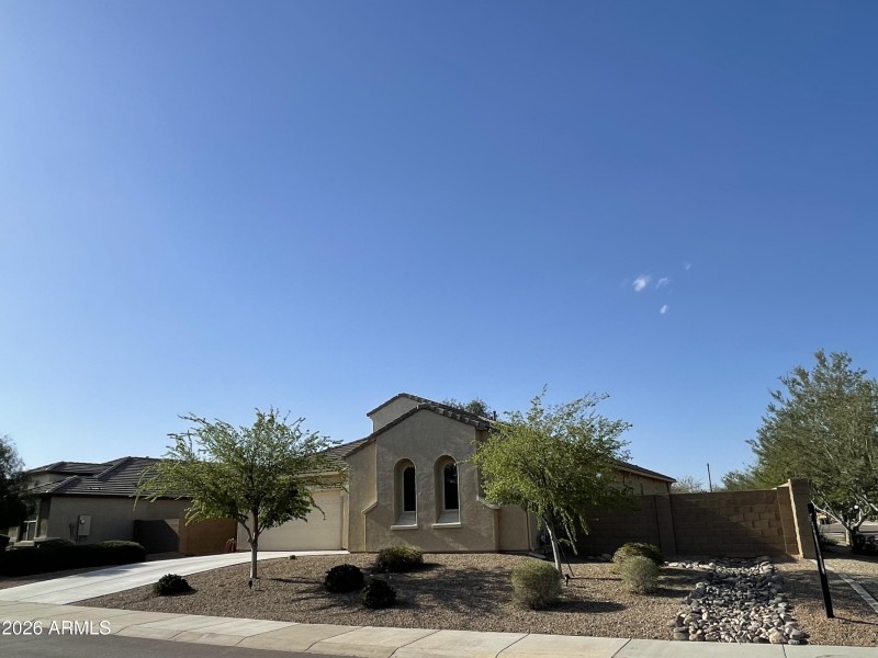 Side Exterior & Front Yard View