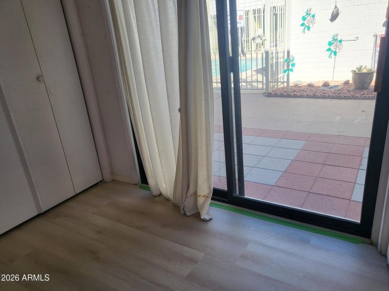 ENCLOSED PATIO & ADDED STORAGE