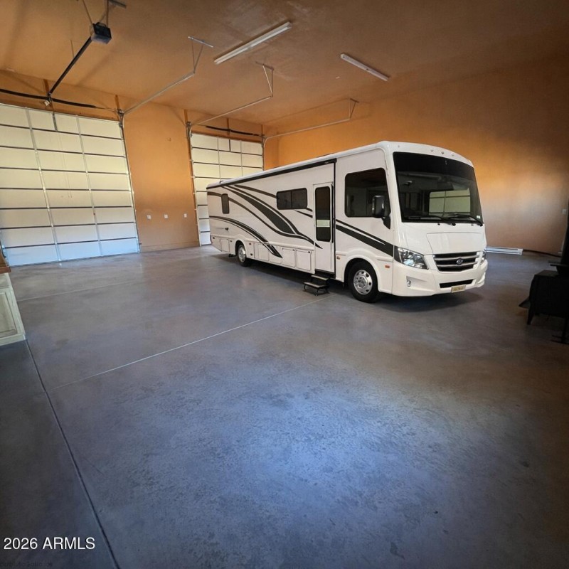 Spacious garage with parked motorhome