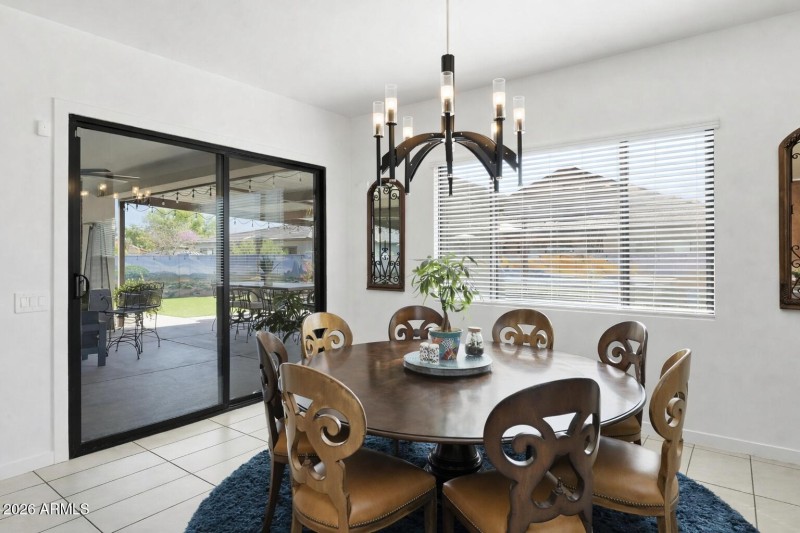 Modern dining space with patio view