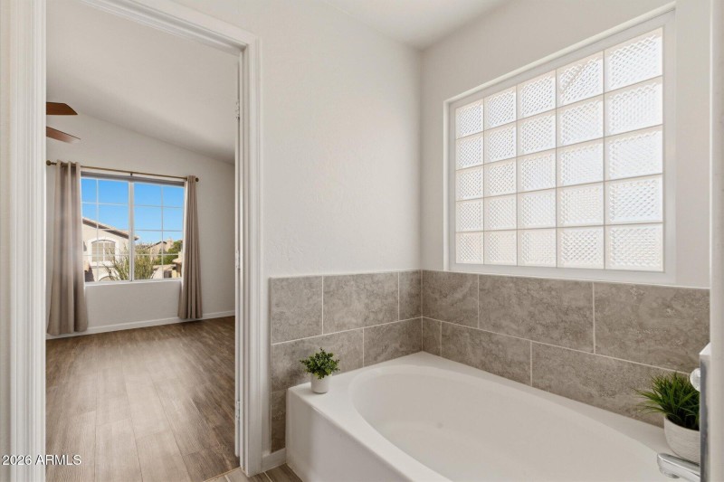 Relaxing bathtub with natural light