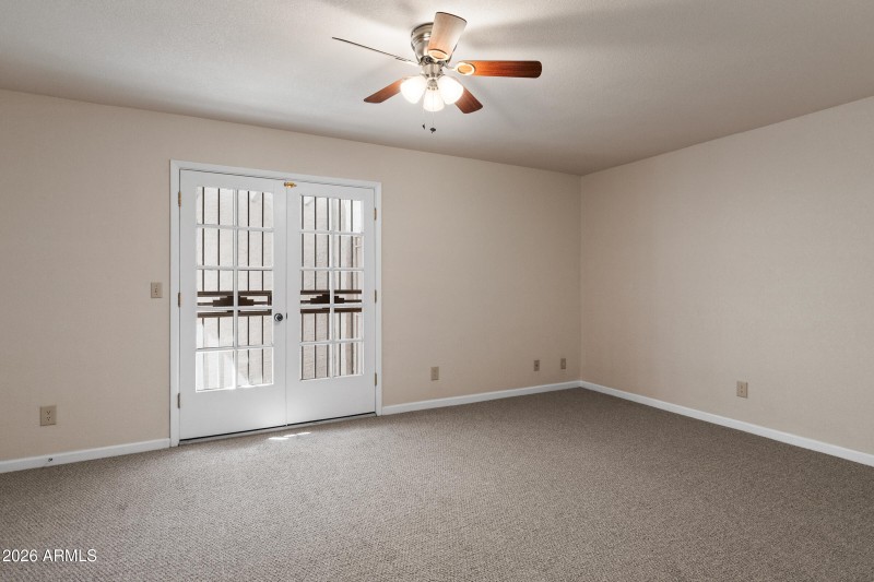 Master bedroom w/ French door to patio