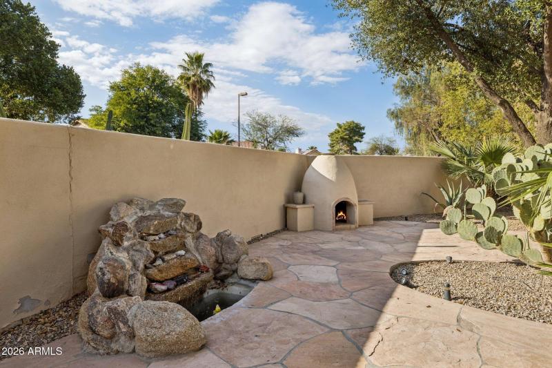 33-Backyard - Water Feature & Fireplace