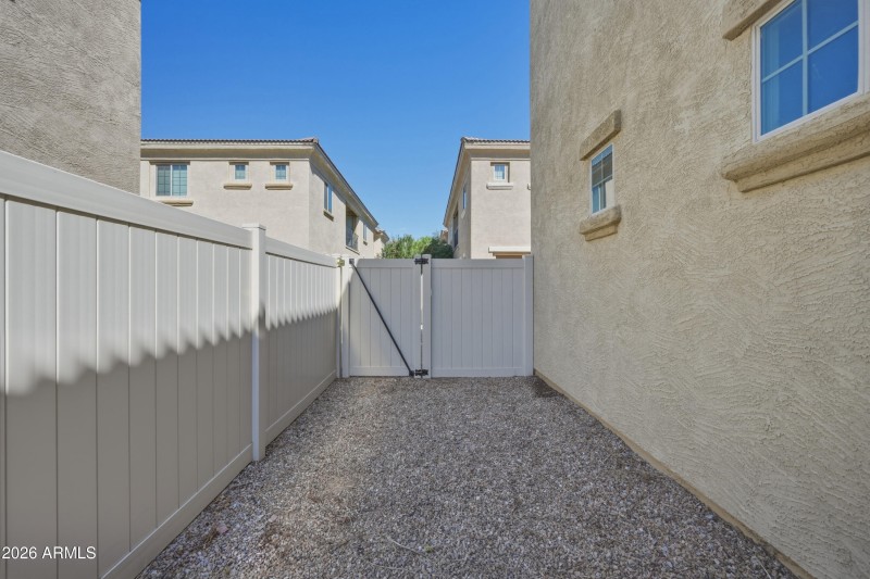 Backyard:Gate Access to Driveway Area