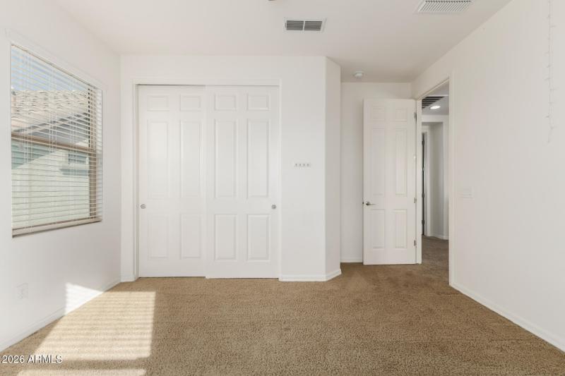 Closet view of secondary bed 2