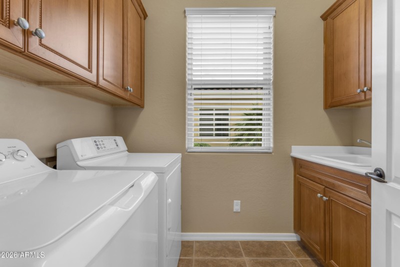 Laundry Room w/Sink & Cabinets