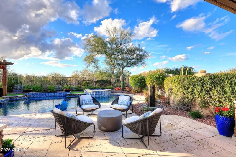 Extended travertine patio