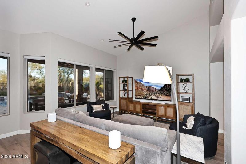 Great room with expansive backyard views