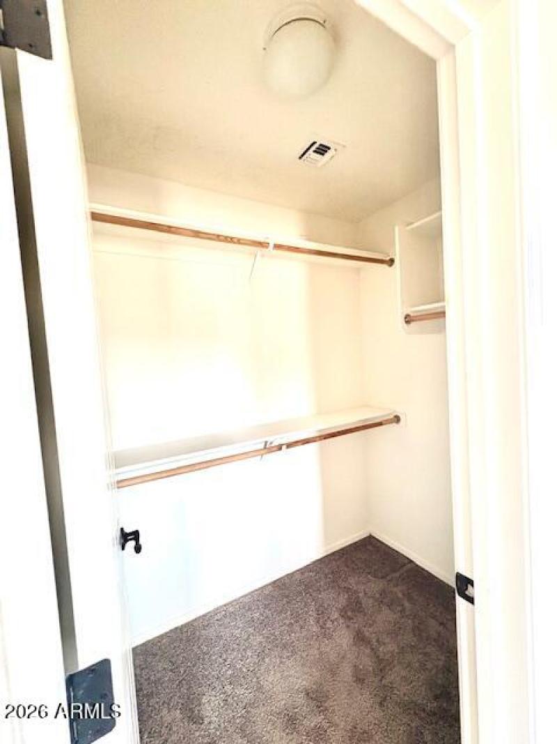 Primary "His" Closet