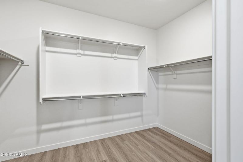Primary Bed Walk in Closet