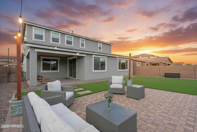 Dusk Paver and Turf Backyard