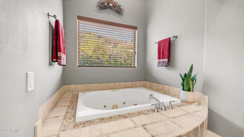 Jetted tub in jack and jill bath