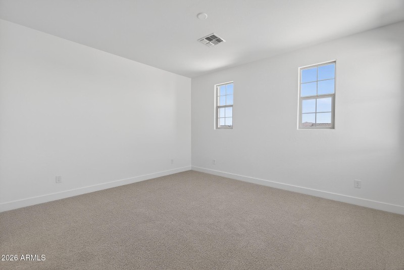 12) PRIMARY BEDROOM UP