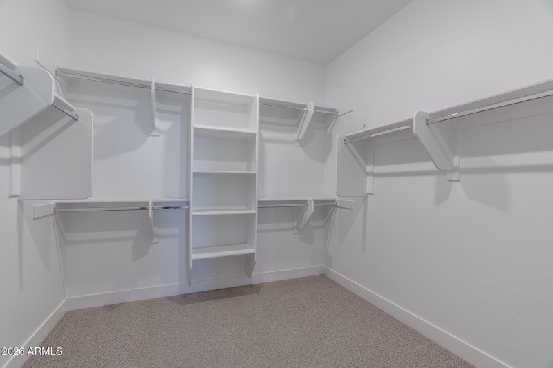 16) PRIMARY CLOSET