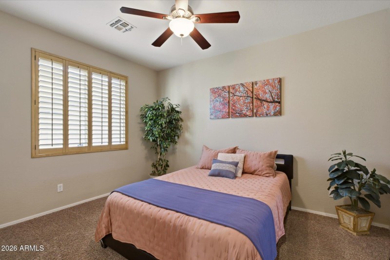 Bedroom with plantation shutters