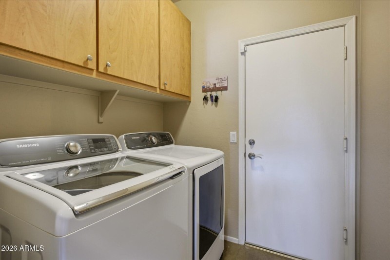 Laundry room with storage cabinets