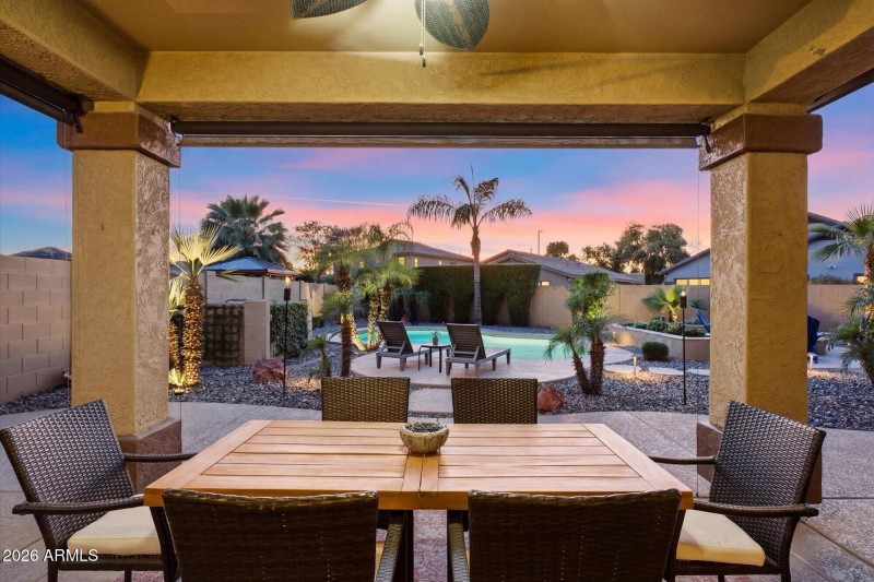 Backyard pool twilight view