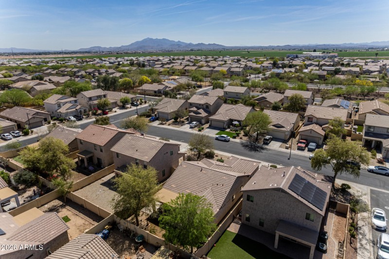 Neighborhood aerial with mountain views
