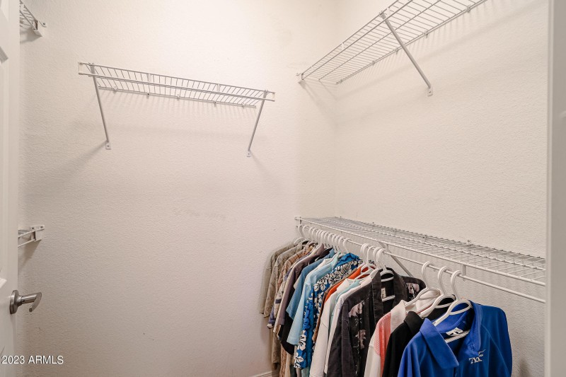 Primary Bedroom walk-in closet