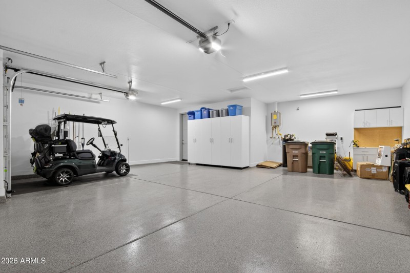 Garage with golf cart bay