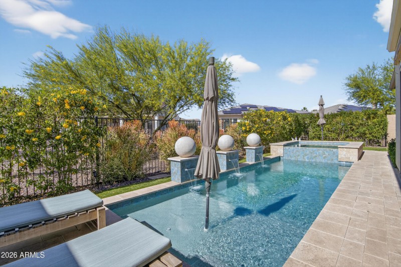 Backyard travertine decking and baja