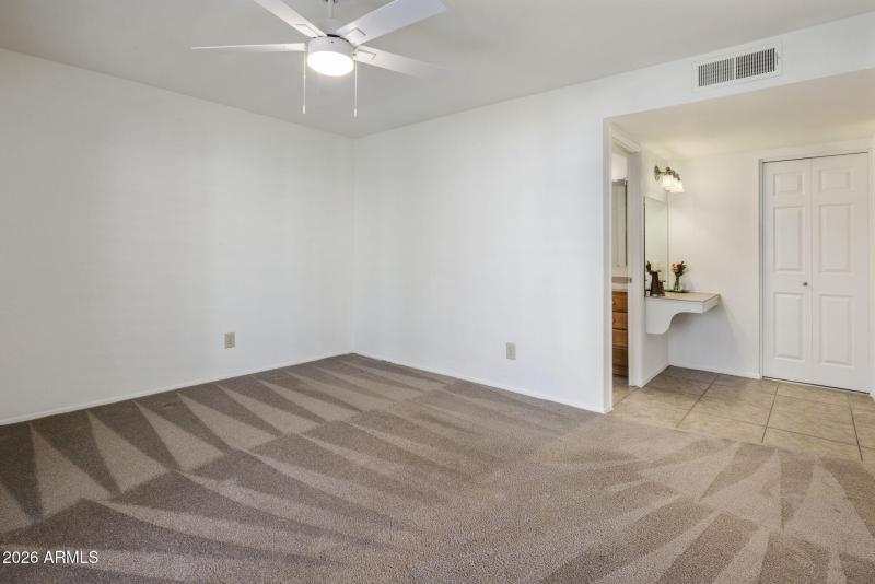 Primary Bedroom & Vanity Area