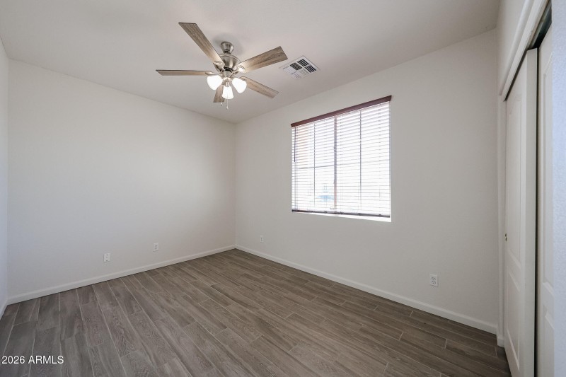Bedroom 3 with wood looking tile