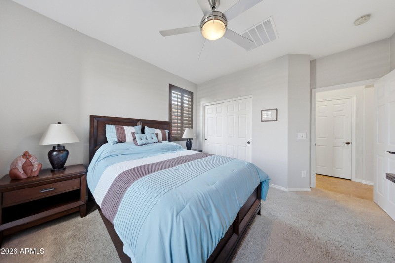 Guest bed near full bath