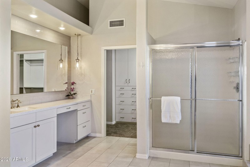 Vanity, shower and walk-in closet