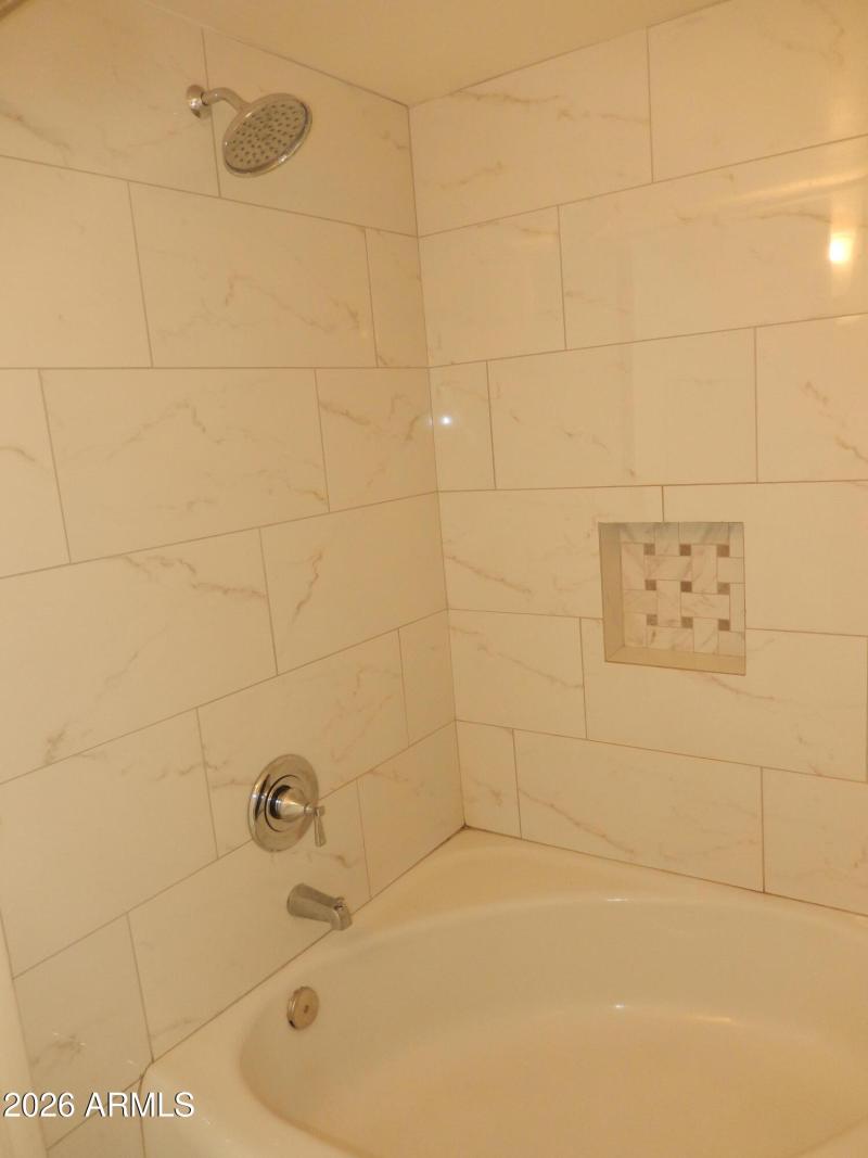 Unit 1 - Shared Tub/Shower