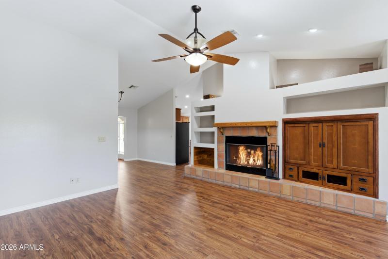 Living Room with Wood Burning Fireplace