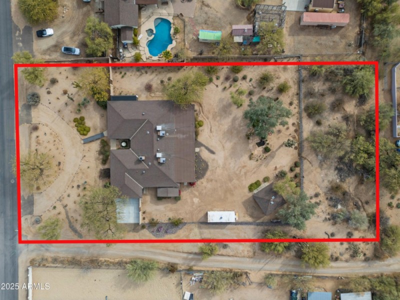 Lot extends past fence line.