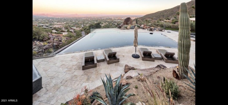 Lounge chairs around pool