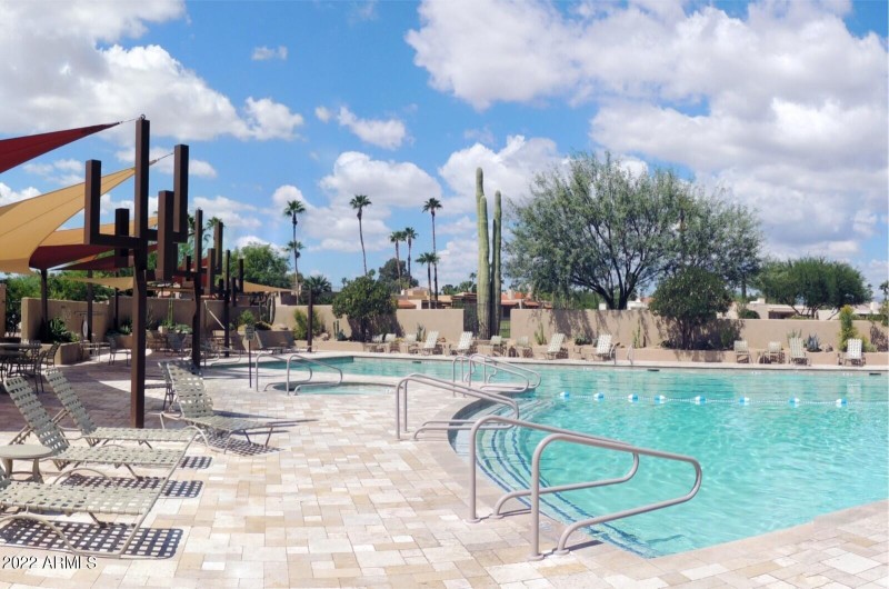Resort-style heated pool with spa