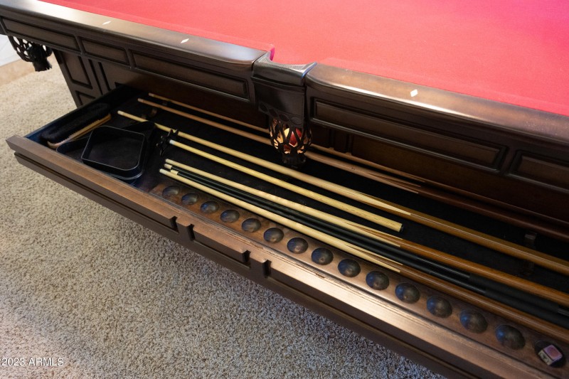 pool table sticks and chalk