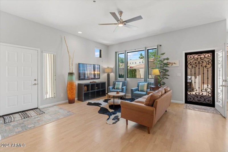 Living Room With Smart TV & Big Fan