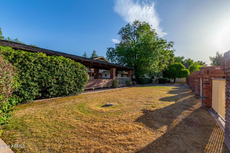 Grass Yard Behind Pool