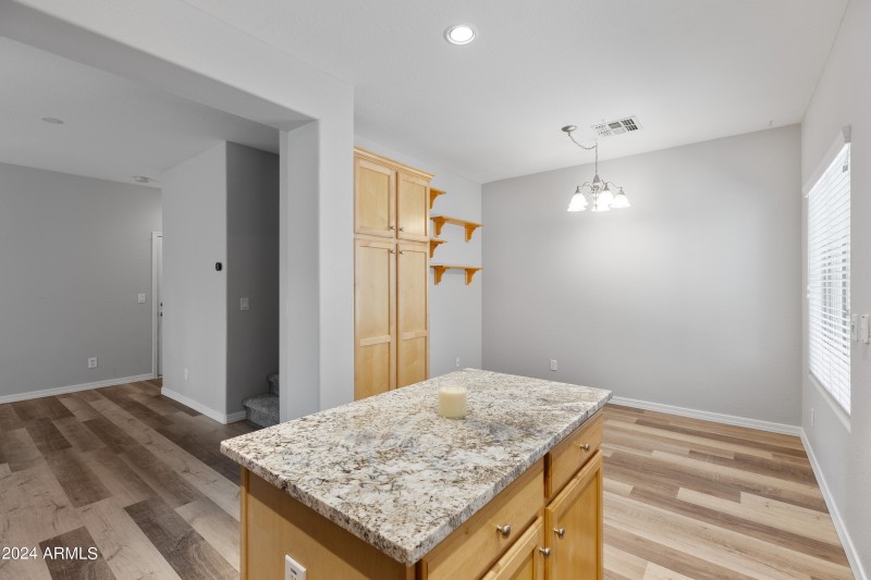 Island, pantry and dining area