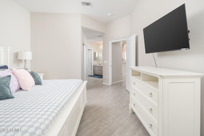 Primary Bedroom w/ King & TV