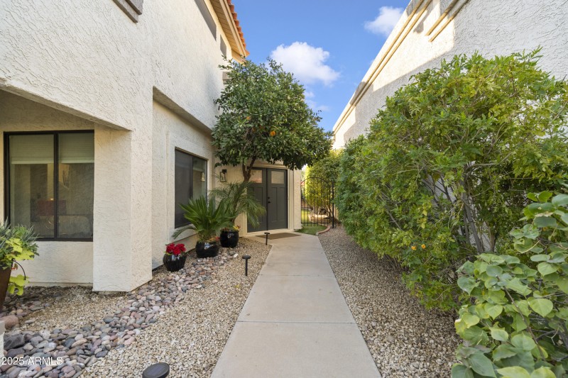 BEAUTIFULLY LANDSCAPED ENTRY