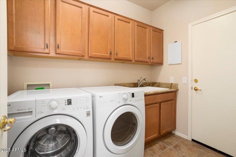 Inside Laundry with Cabinets & SINK!