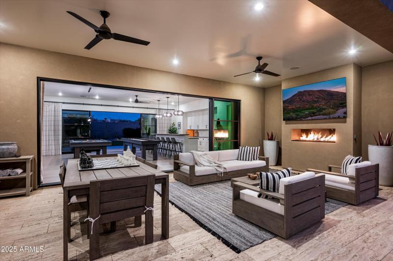 Enjoy dinner outside by the fireplace