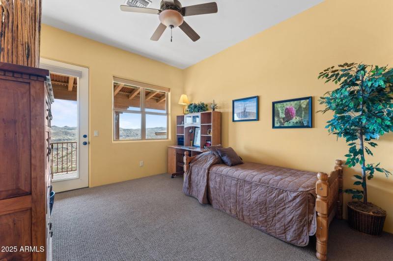 Bedroom three, entrance to deck